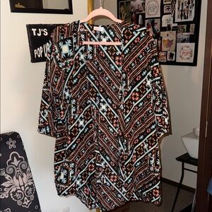 LuLaRoe Black and Blue Patterned Blouse